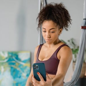 Portrait photo of a smiling woman, the yoga instructor.